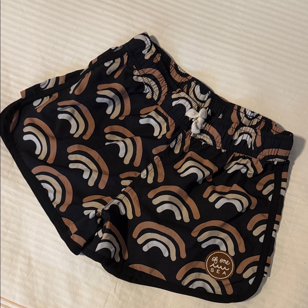 Of One Sea Rainbow Patterned Swim Shorts